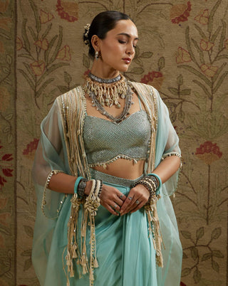 Sva By Sonam And Paras Modi Teal Blue Tassel Cape And Draped Skirt Set available on indiaspopup