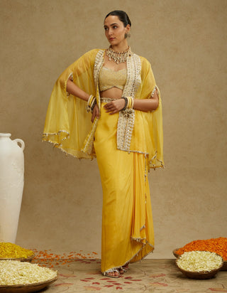 Sva By Sonam And Paras Modi Yellow Metal Embellished Bustier, Organza Cape And Skirt Set available on indiaspopup