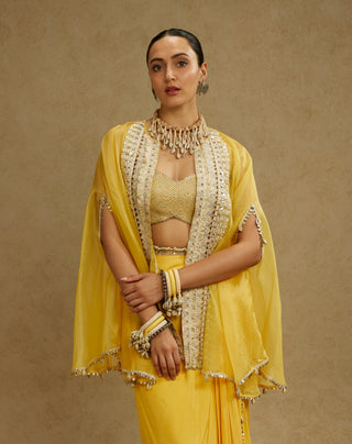 Sva By Sonam And Paras Modi Yellow Metal Embellished Bustier, Organza Cape And Skirt Set available on indiaspopup