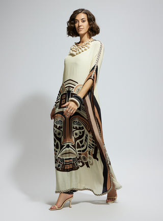 Ivory silk kaftan and brown printed pants