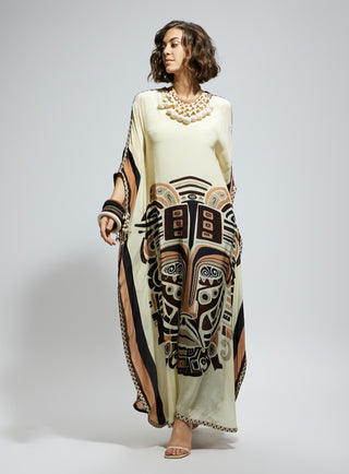 Ivory silk kaftan and brown printed pants