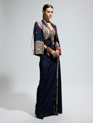 Blue threadwork cape with bustier and high slit skirt