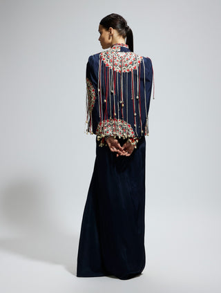 Blue threadwork cape with bustier and high slit skirt