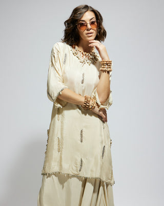 Sva By Sonam And Paras Modi Ivory Silk Embellished Tunic And Drape Skirt available on indiaspopup