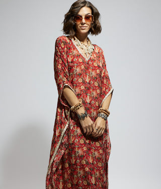 Orange heavily embellished kurta and pants