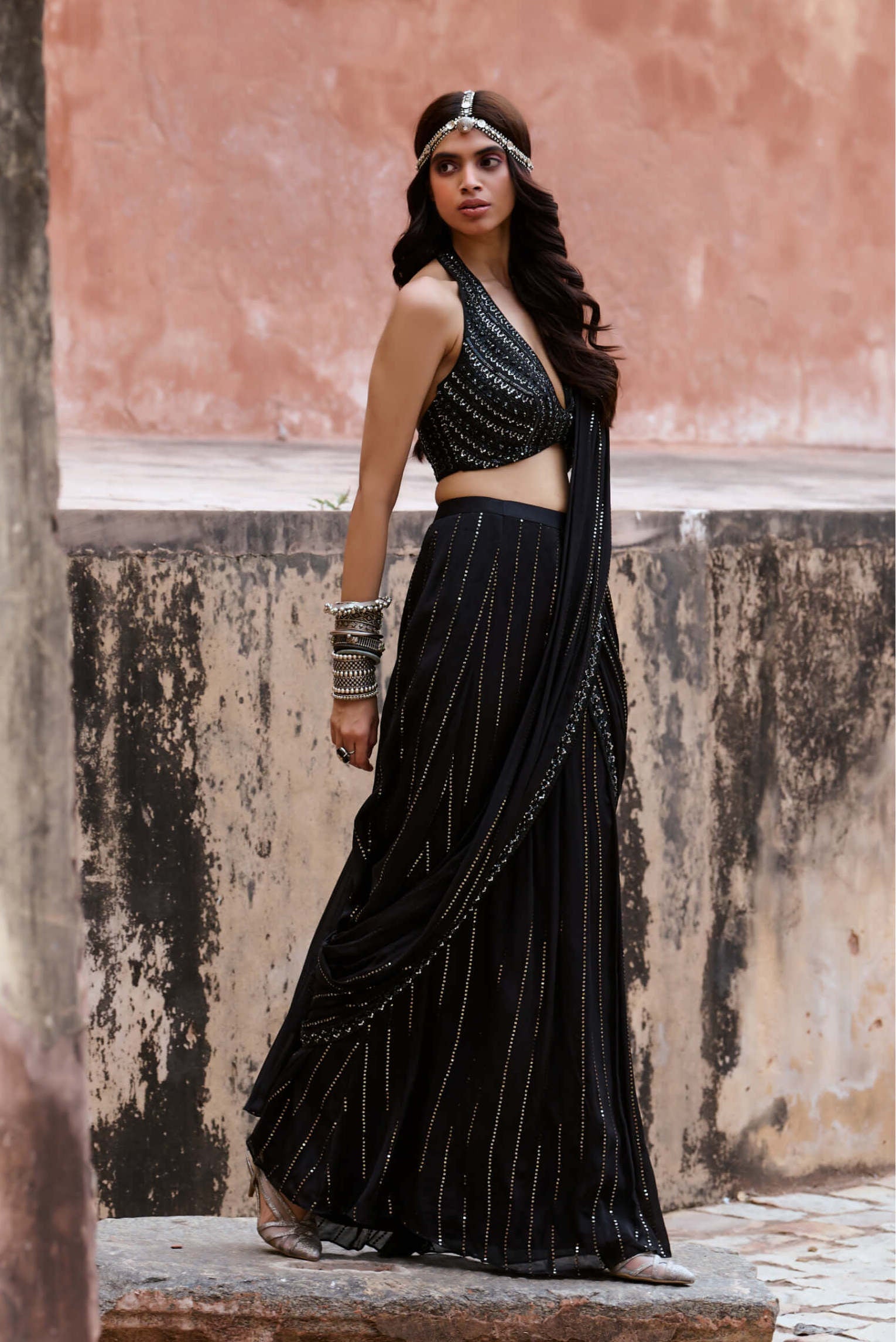 sari evening dress A saree that feels timeless, a silhouette that feels now. Discover bridals and more at Panache By Sharmeen in Houston. #PanacheBySharmeen Bridesmaids outfit, modern saree, draped saree, neutral saree