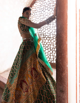 Dark Green Bandhani Banarasi Lehenga Set by Aditi Gupta available on Indiaspopup.com