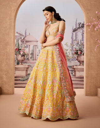 Vibrant Yellow Embroidered Lehenga Set by Aneesh Agarwaal available on Indiaspopup.com