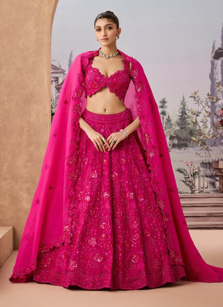 Magenta hued embroidered lehenga set