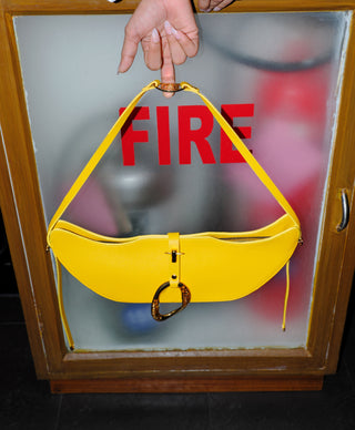 Occhre yellow boss swing bag