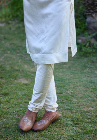 Ivory Pleated Kurta And Churidar by Ankit V Kapoor available on Indiaspopup.com