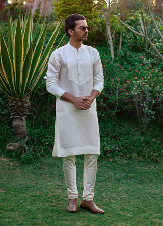 Ivory Pleated Kurta And Churidar by Ankit V Kapoor available on Indiaspopup.com