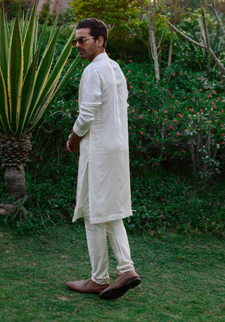 Ivory Pleated Kurta And Churidar by Ankit V Kapoor available on Indiaspopup.com