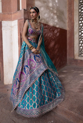 Teal Bandhani Banarasi Lehenga Set by Aditi Gupta available on Indiaspopup.com