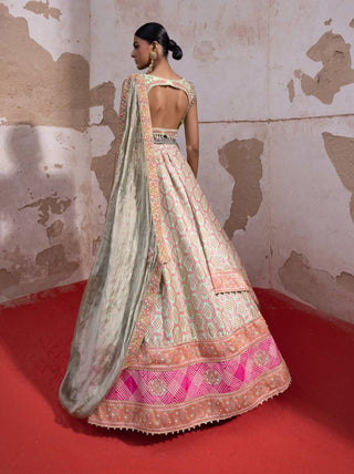 Pista Green Bandhani Banarasi Lehenga Set by Aditi Gupta available on Indiaspopup.com