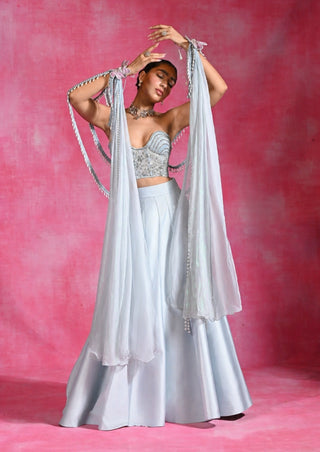 Icy blue corset lehenga set with cape