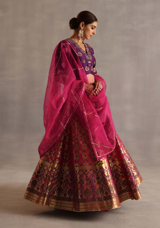 Saras purple and rani pink lehenga set