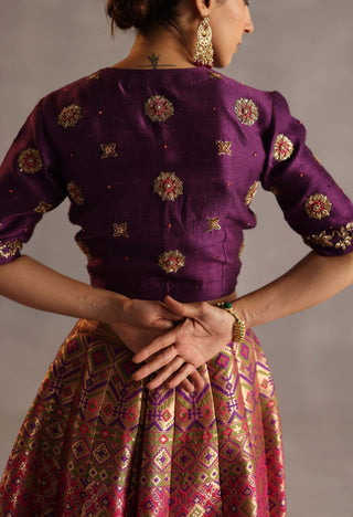 Saras purple and rani pink lehenga set
