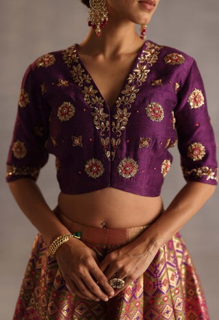 Saras purple and rani pink lehenga set