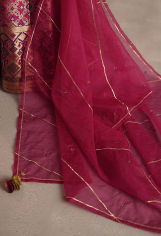 Saras purple and rani pink lehenga set