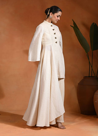 Long tales ivory anarkali and pant