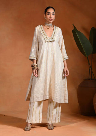 Ivory kurta and pants set with metal accents