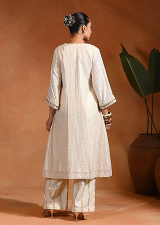 Ivory kurta and pants set with metal accents