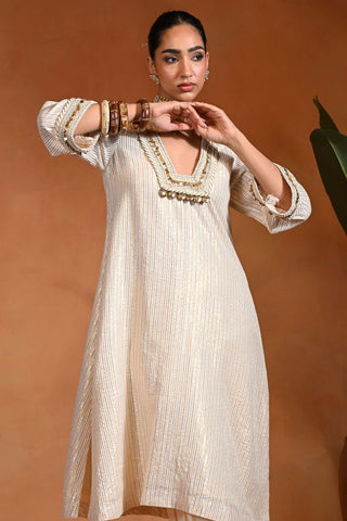 Ivory kurta and pants set with metal accents