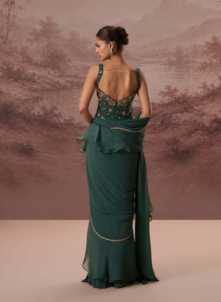 Green harit drape sari and corset blouse