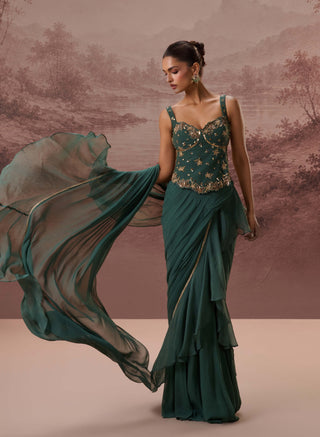 Green harit drape sari and corset blouse
