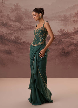 Green harit drape sari and corset blouse