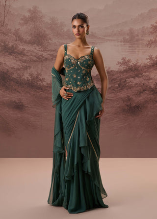 Green harit drape sari and corset blouse