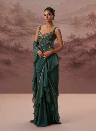 Green harit drape sari and corset blouse