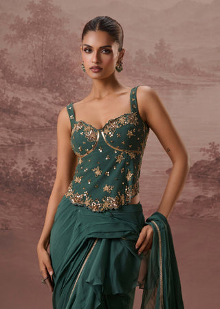Green harit drape sari and corset blouse