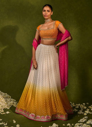 Devika ivory saffron lehenga set