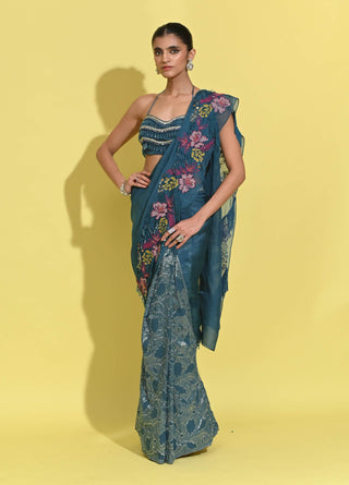 Whirl Cyan Blue Blouse And Sari by Rishi & Vibhuti available on Indiaspopup.com