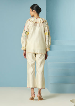 Ivory embroidered straight pants