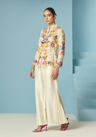 Ivory embroidered pleated pants