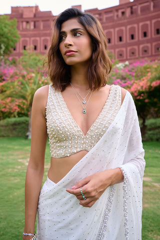 Anitya Ivory Sari And Blouse by Chamee And Palak, available on Indiaspopup.com