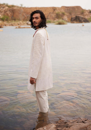 Adhir Ivory Sherwani And Pants by Mishru Men, available on Indiaspopup.com