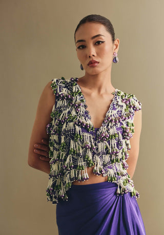 Purple beaded cropped jacket and draped skirt