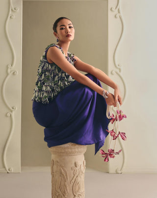 Purple beaded cropped jacket and draped skirt