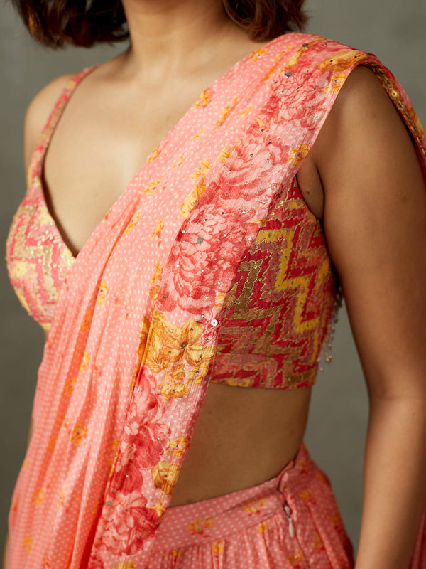 Coral embroidered sari and stitched blouse