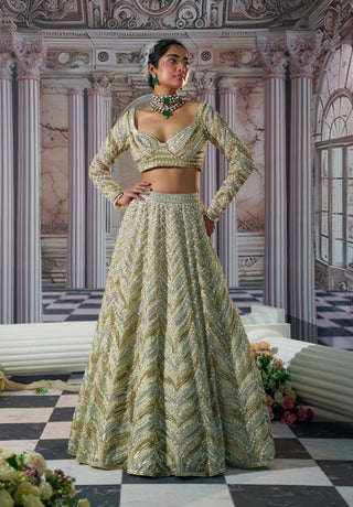 Aphrodite Goddess Golden Lehenga Set by Nidhika Shekhar available on Indiaspopup.com