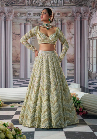 Aphrodite Goddess Golden Lehenga Set by Nidhika Shekhar available on Indiaspopup.com