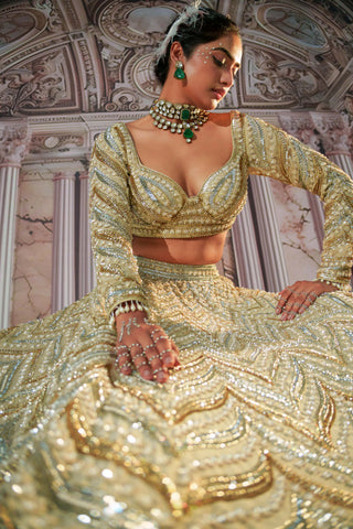 Aphrodite Goddess Golden Lehenga Set by Nidhika Shekhar available on Indiaspopup.com