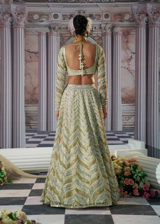 Aphrodite Goddess Golden Lehenga Set by Nidhika Shekhar available on Indiaspopup.com