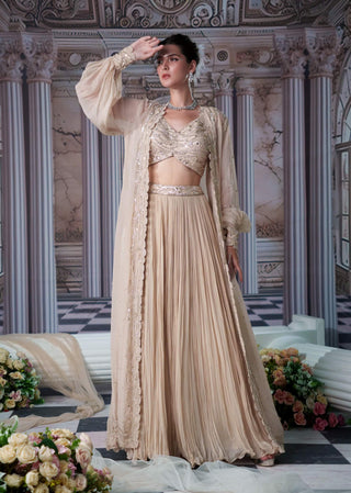 Venus Nude Lehenga And Cape Set by Nidhika Shekhar available on Indiaspopup.com