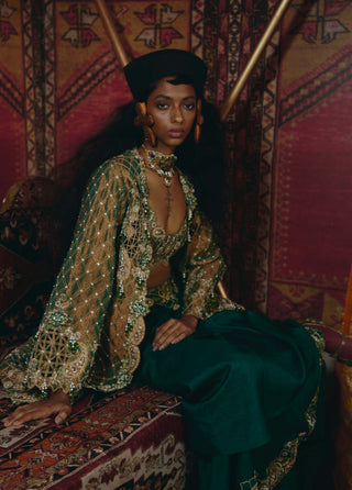 Emerald green draped skirt and jacket set