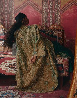 Emerald green draped skirt and jacket set